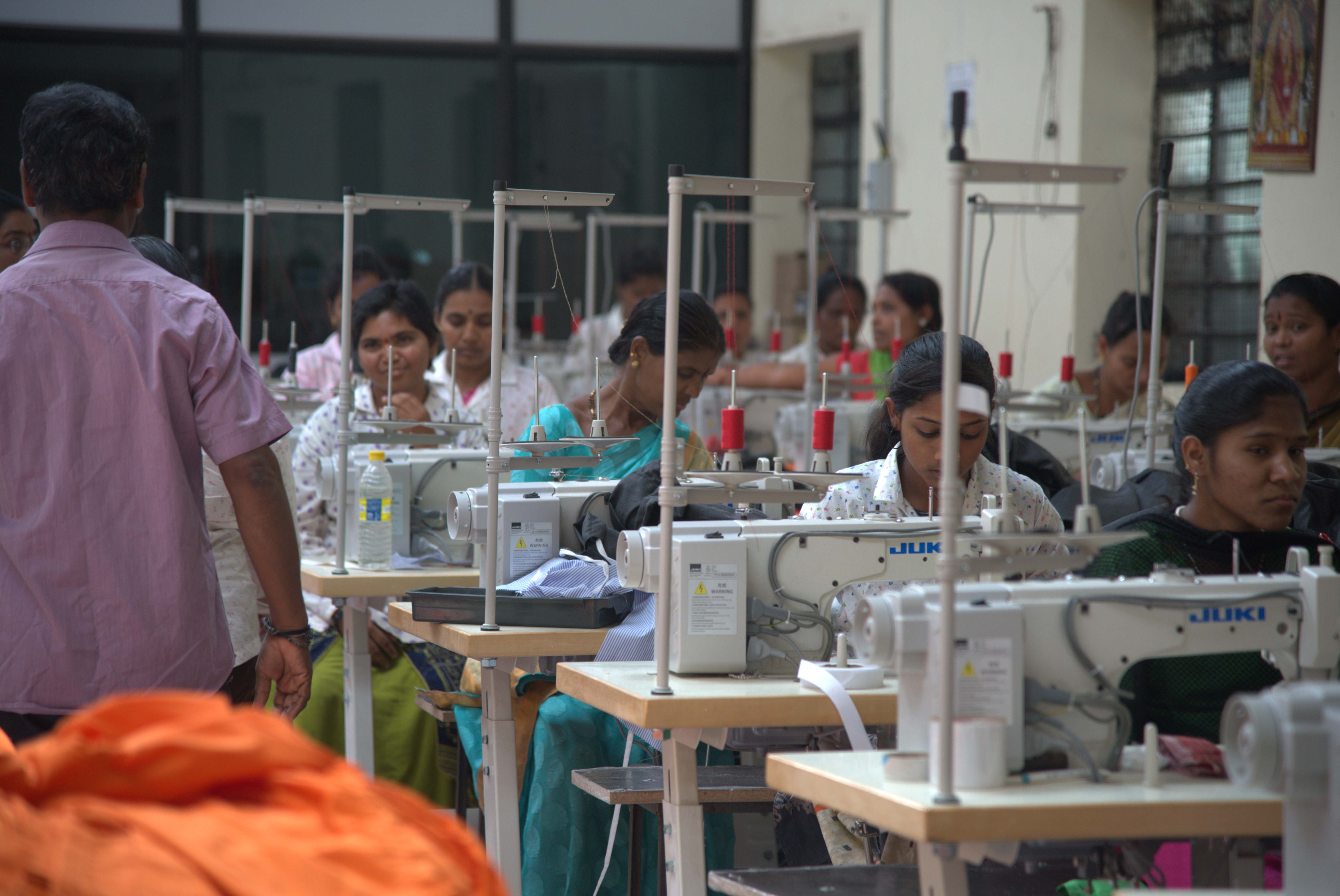 Workers Stitching